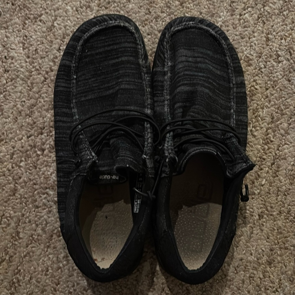 Boys/Mens size 7 HeyDude slip ons 
Black